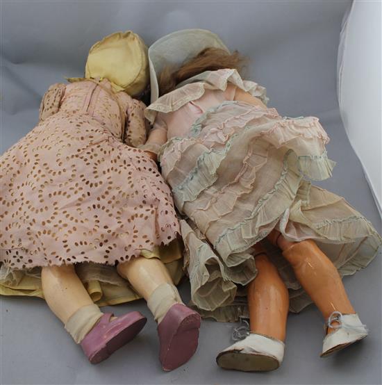 An Armand Marseille bisque headed doll & another doll